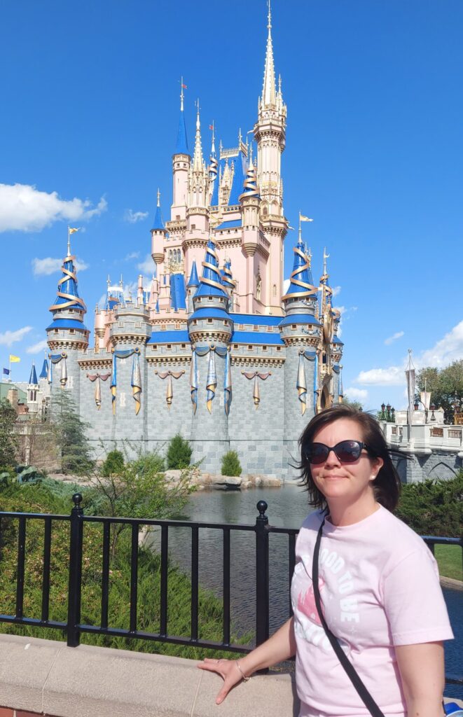 Amy Urquhart at Cinderella Castle in Walt Disney World, Disney vacation planning specialist