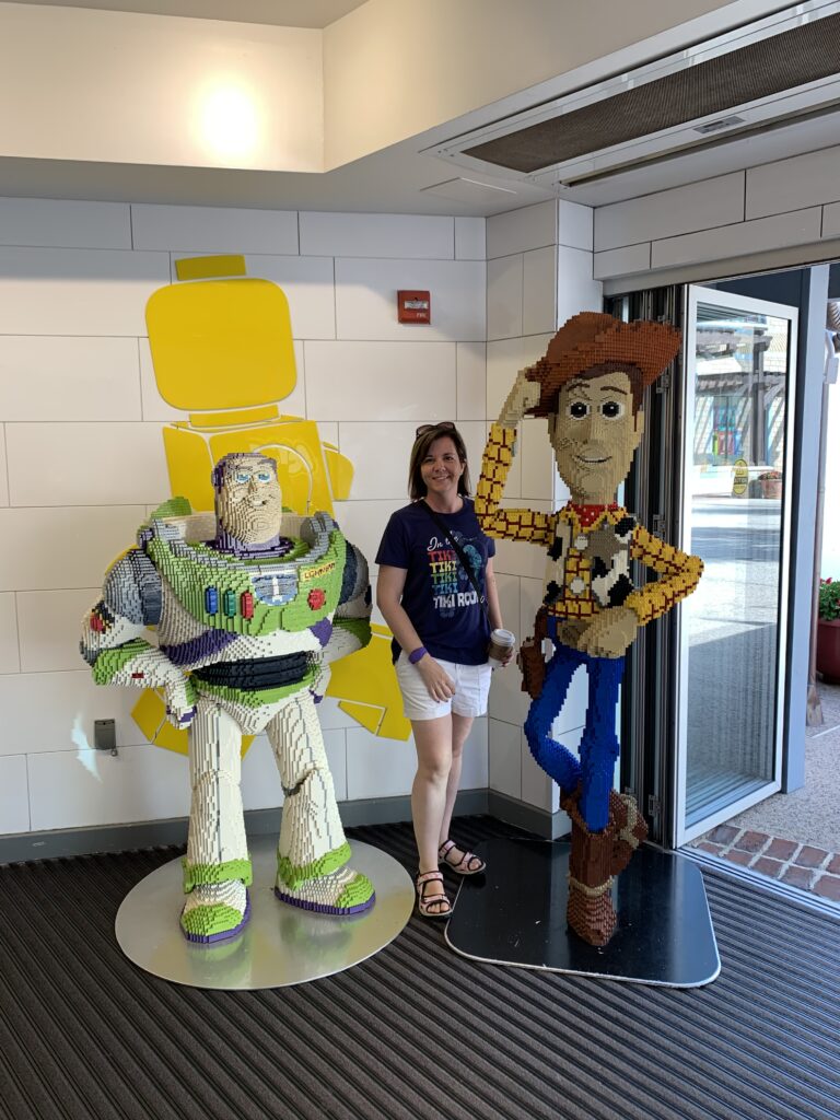 lifesize lego toy story characters with woman